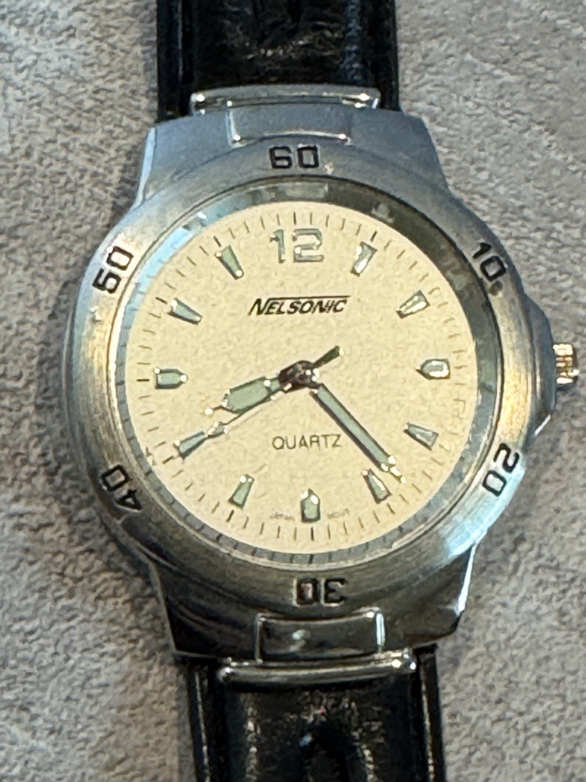 Nelsonic Quartz Analog Wristwatch Beige Dial Black Leather Strap Silver Case