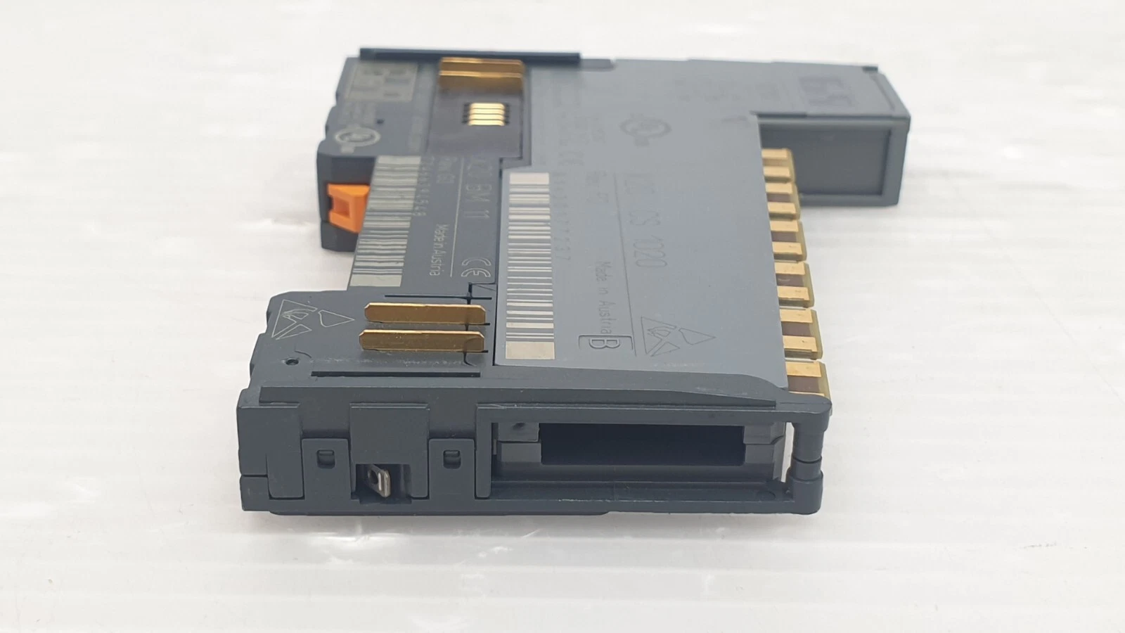 Underside of the X20CS1020 and X20BM11 assembly, labels and gold contacts