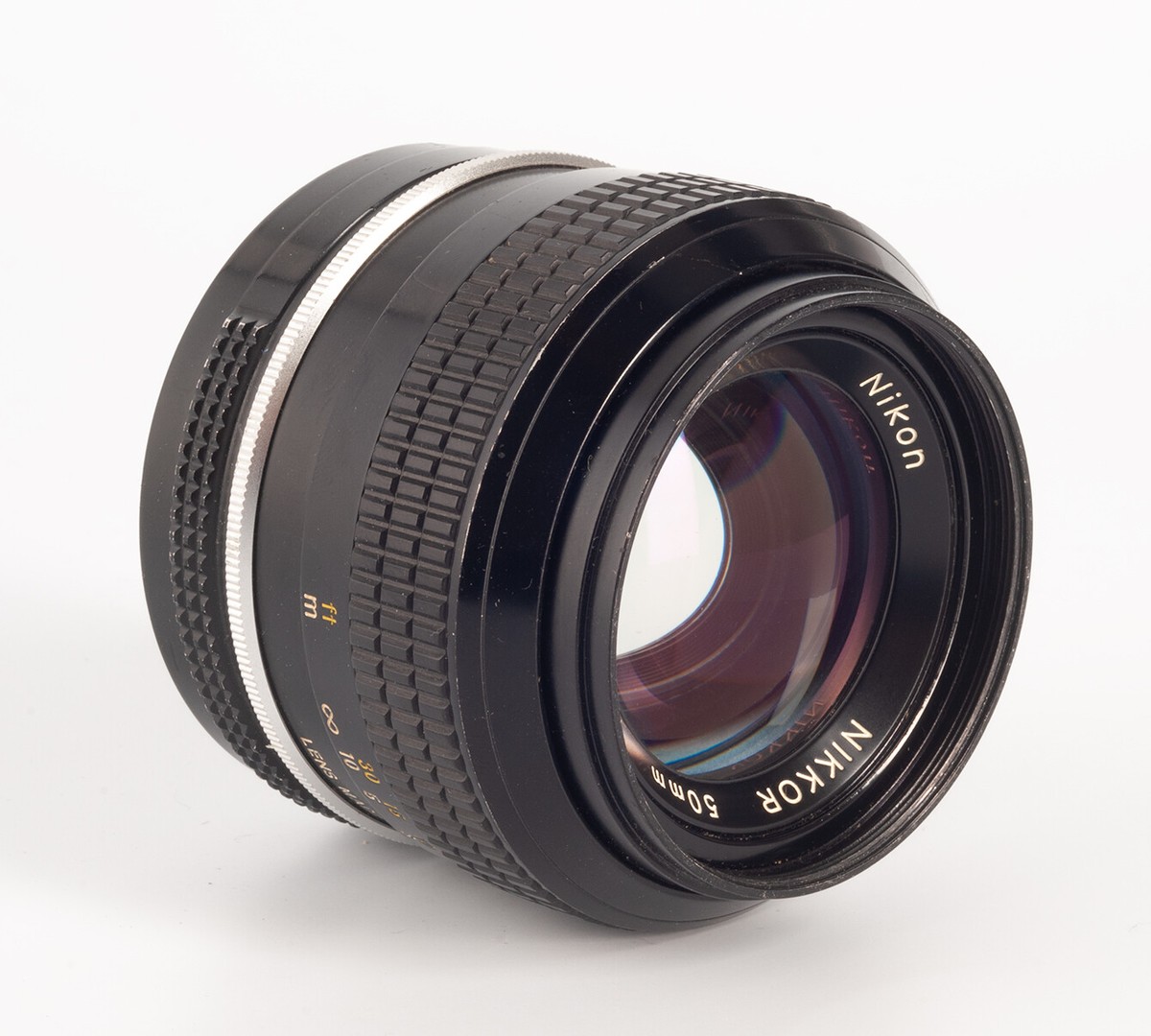 Nikon Nikkor 50mm f1.4 Non-Ai with metal hood - Serial Nikon Nikkor 50mm f1.4 Non-Ai with metal hood - Serial