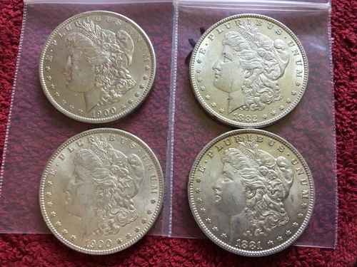 MORGAN SILVER DOLLAR COINS.  LOT OF 4  UNCIRCULATED   PRE. 1921 LOT # 28