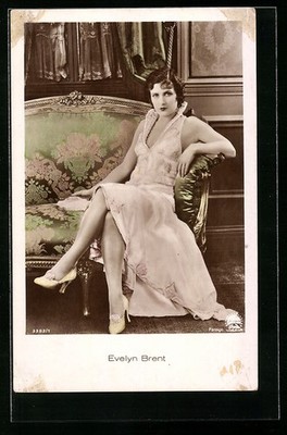 Postcard Actress Evelyn Brent Sitting On A Sofa 