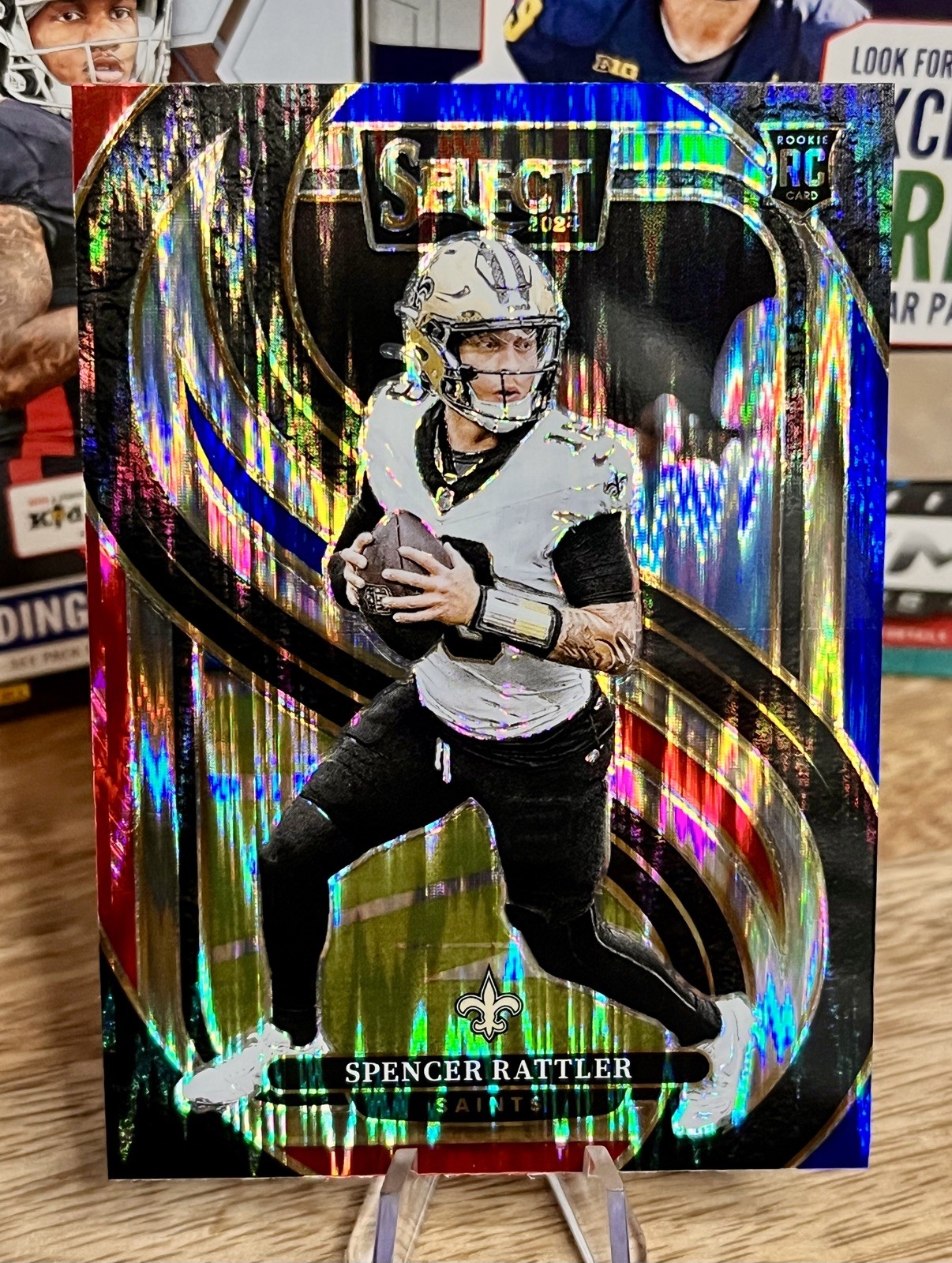 2024 Panini Select Red Blue Prizm Shock #130 Spencer Rattler RC Saints Premier