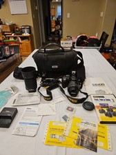 Nikon D5100 Digital Camera with Case, lenses, Guides, SD Cards  Charger W/cords