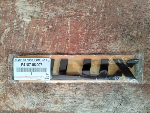 TOYOTA HILUX REVO 2015-22 EMBLEM LOGO BACK FRONT DOOR BLACK OEM - FREE SHIPPING - Picture 2 of 4