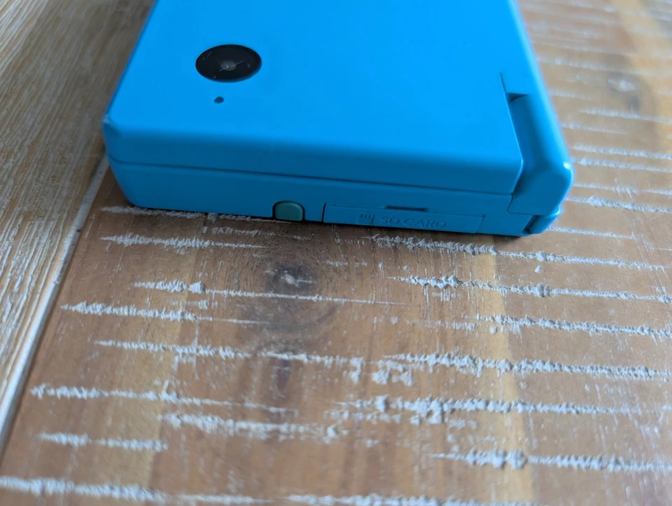 Nintendo DSi Light Blue Handheld System Bundle TWL-001 ( USA ) w/t Cable & Games - Image 4 of 4