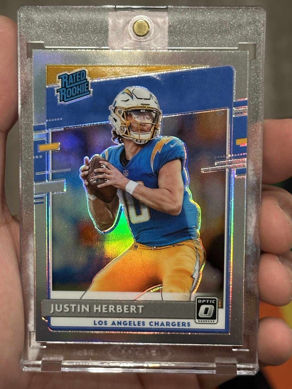 2020 Donruss Optic Justin Herbert Rated Rookie Holo Prizm RC Chargers #153