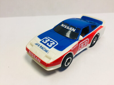 AFX / TOMY 300 ZX #33 ( LT BL VERSION ) & AW chassis ~ BRAND NEW