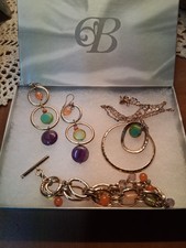 Beautiful gold and multi colored beads necklace, bracelet, and earrings