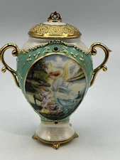 ARDLEIGH ELLIOTT ANGER MUSIC BOX 6" HIGH X 4" WIDTH. PLAYS "ON THE WINGS OF LOVE