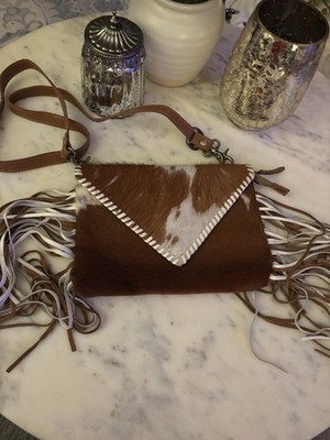 myra cowhide purse