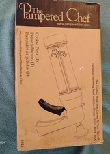 The Pampered Chef 1525 Cookie Press with 16 Discs - White