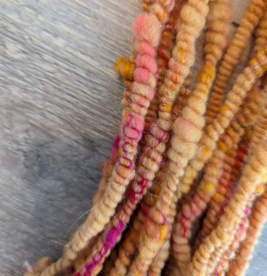 Handspun Art Yarn coilspun peach orange Saori weaving Nuno felt craft chunky