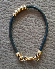 Bracciale In Caucciù E Metallo Dorato
