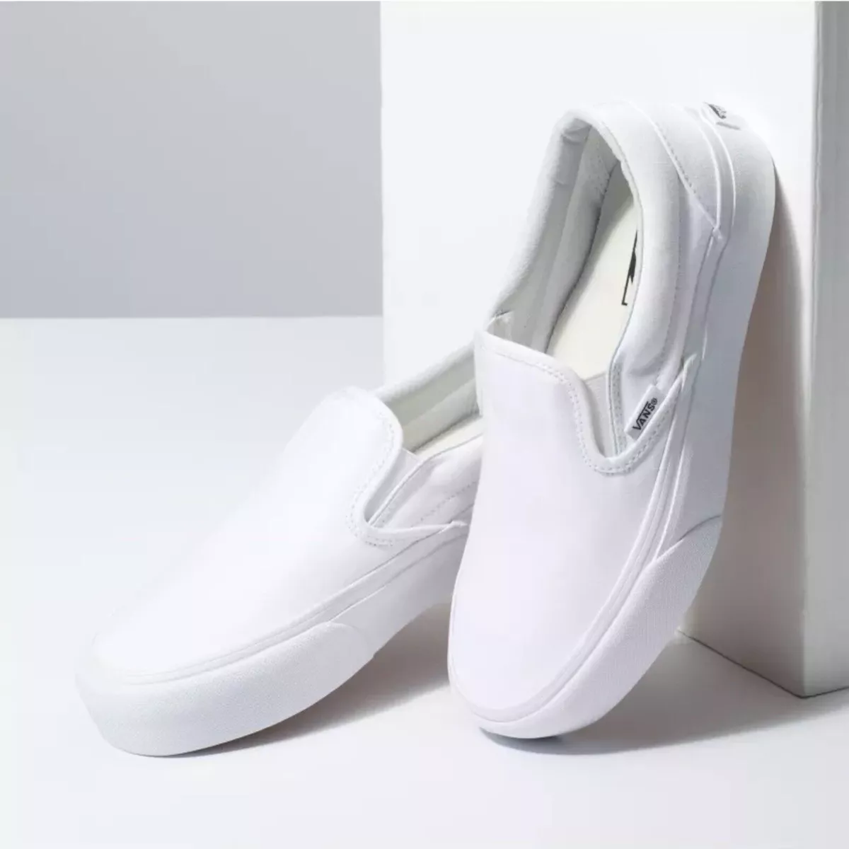 Vans slip hotsell on platform white