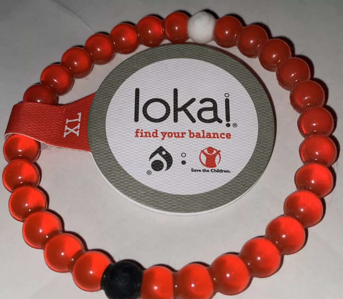Clear red lokai bracelet deals meaning
