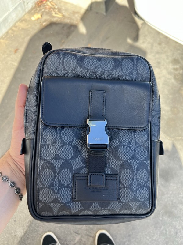 The Coach Crossbody Bag In Black Front Clip Pocket and Big Zipper Closure