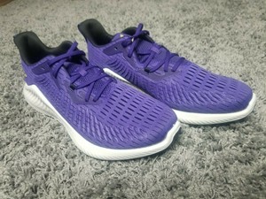 purple and gold running shoes