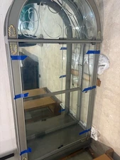 glass curio cabinet with glass doors