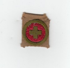 Merit Badge First Aid Type AH1 1st issue counterclockwise border 1912