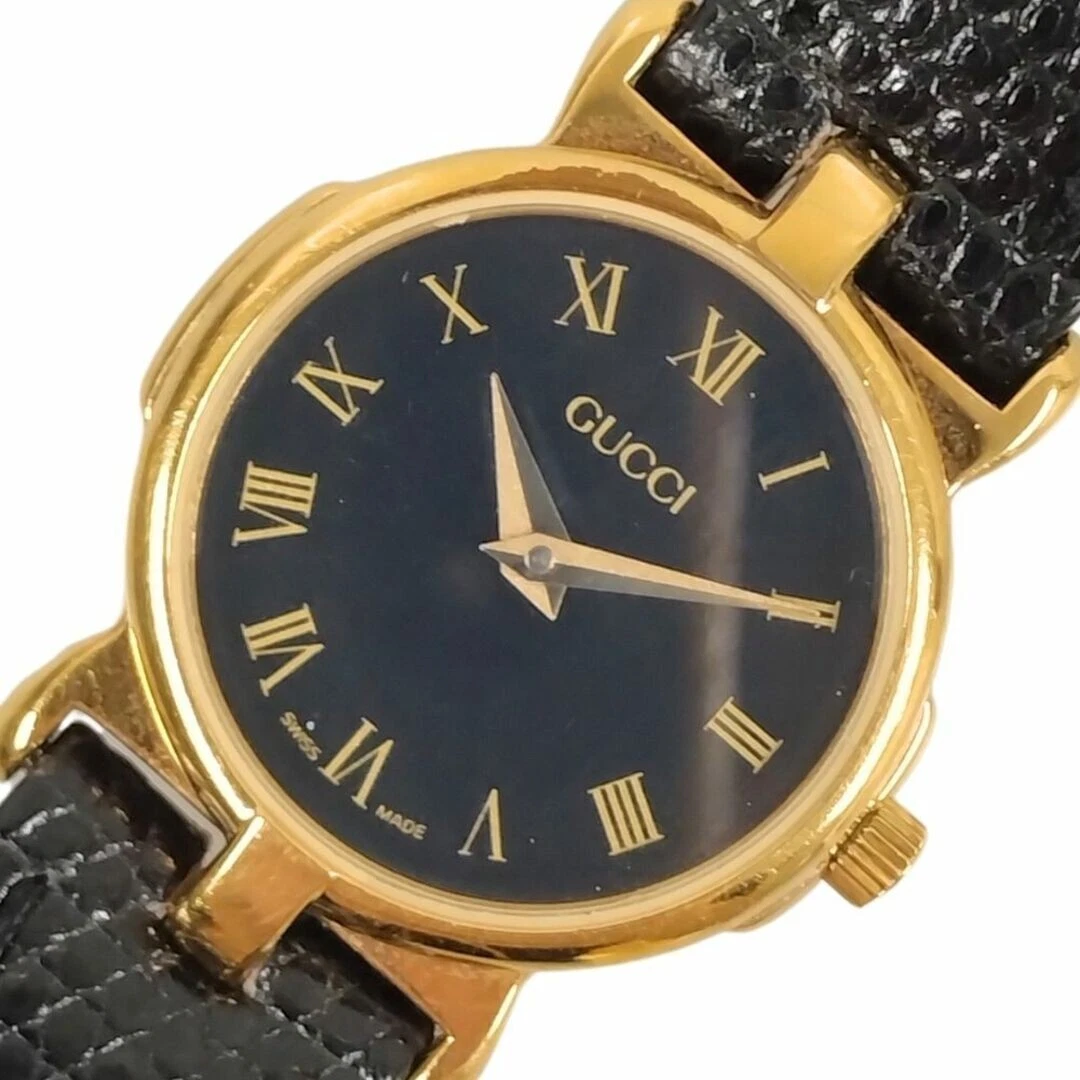 Montre femme GUCCI 3400L cadran noir quartz doré authentique
