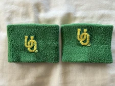 UNIVERSITY OF OREGON DUCKS GREEN/YELLOW WRISTBANDS SET USED EXCELLENT CONDITION