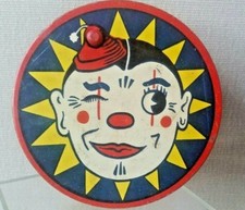 Litho Tin Toy Kirchhof CLOWN FACE Ratchet Noisemaker WINKING EYE noise maker