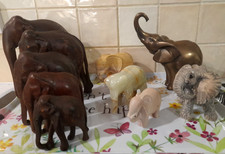 COLLECTION OF TEN ELEPHANT ORNAMETS, WOOD~ONYX~SANDSTONE~STONE~METAL