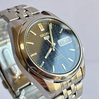 Seiko 5 SNK361K1 Automatic 21J Day-Date Blue Textured Dial See-Through Back Men