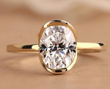 Oval Cut 1.25CT White Moissanite Women Half Bezel Set Ring In 10K Yellow Gold