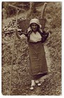 Postcard Swiss folk costume Switzerland peasant farmer girl rake basket Lausanne