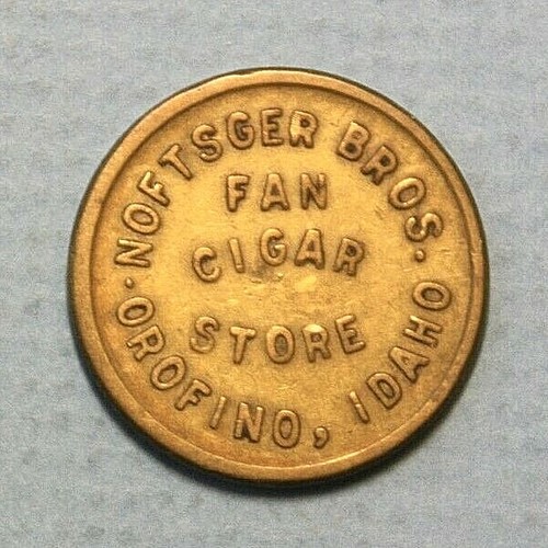 Orofino Idaho Noftsger Bros Fan Cigar Store Good for 5c Trade Brass 24