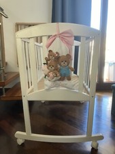 culla a dondolo marca PICCI usata in buone condizioni .