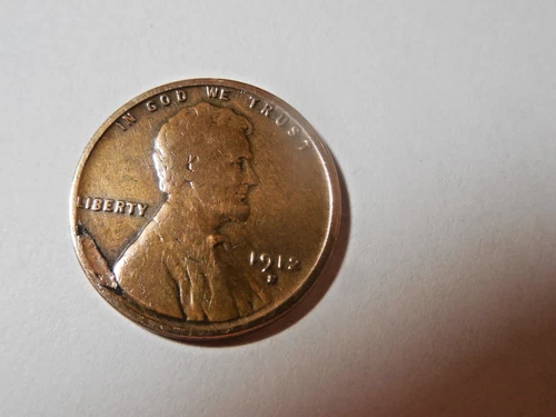 1912 S Lincoln Cent, in Fine condition. Has a dent on front. But you decide!!!!!