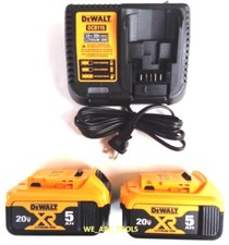  2  Dewalt 20V DCB205 5.0 AH Batteries, 1 DCB115 Charger 20 Volt