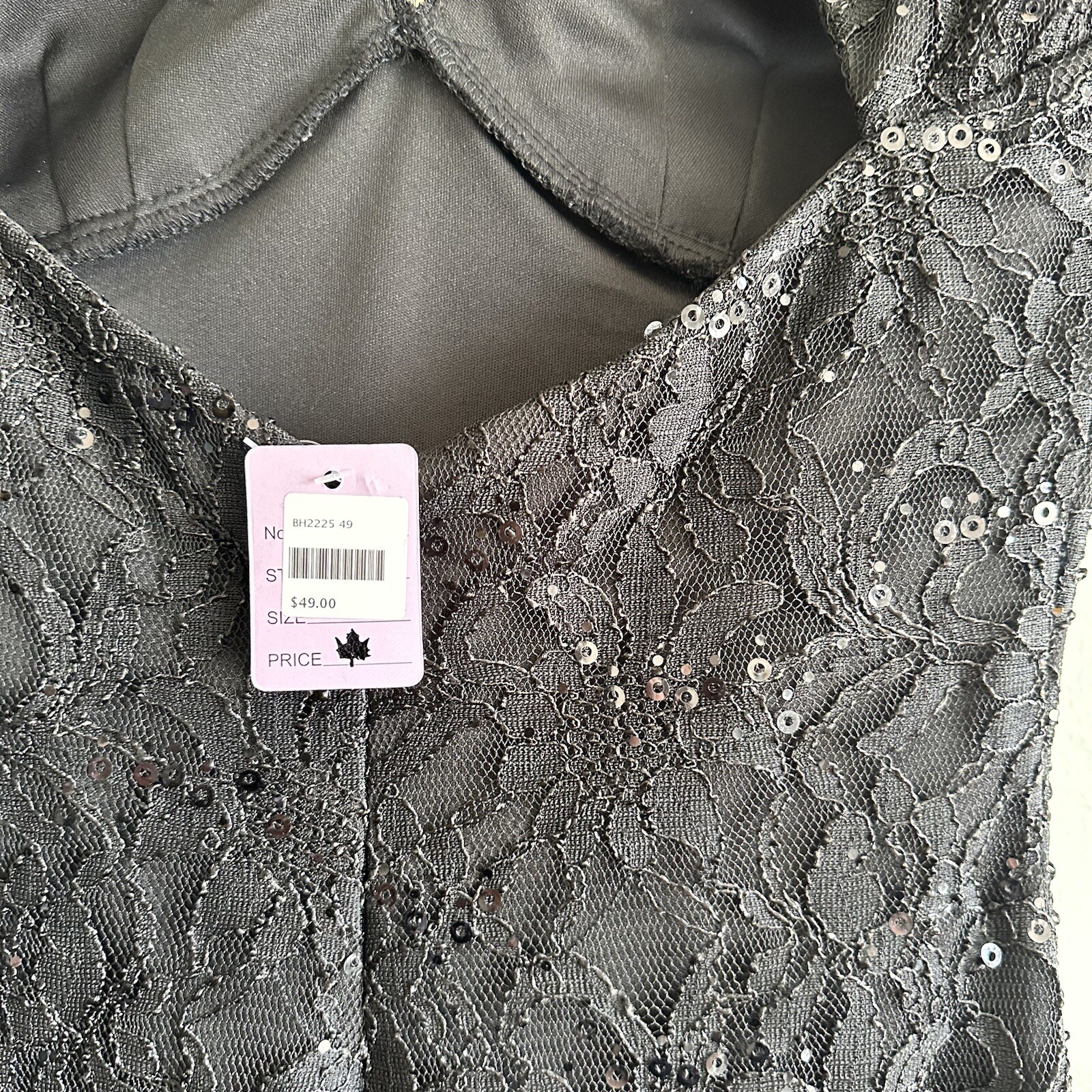 как выглядит Davids Bridal Bridesmaid Dress Black With Embroidered Design In Front Midi Lace фото