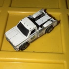 1974 Hot Wheels Redlines Tow Truck "Larry's" White Hong Kong. MISSING PARTS.
