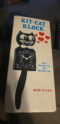 Kit Cat Klock with Rolling Eyes/Waggling Tail Plug in Working With Paperwork