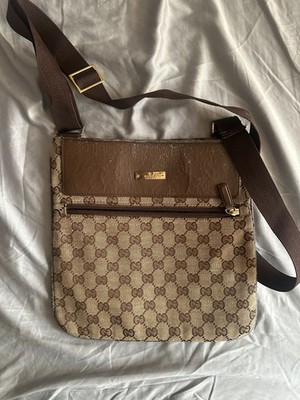 old designer handbag with cross body strap