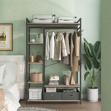 Organized Garment Rack Storage Closet System with Open Shelves and Hanging Rod