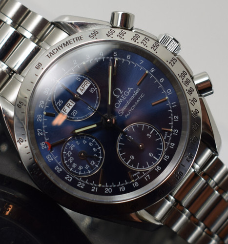 omega 3523.80.00 speedmaster triple date  genric box/manual/1 yr gtee perfect