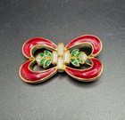 Vintage MONET Gold Tone Christmas Bow / Holly Pin Brooch Red Green Enamel — photo 4