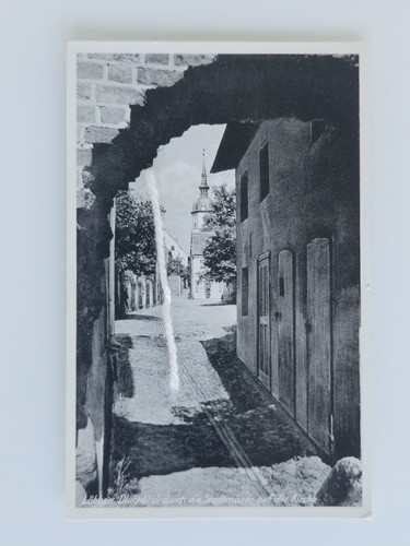 Postcard Lübben Brandenburg view through the city walls of the church not used