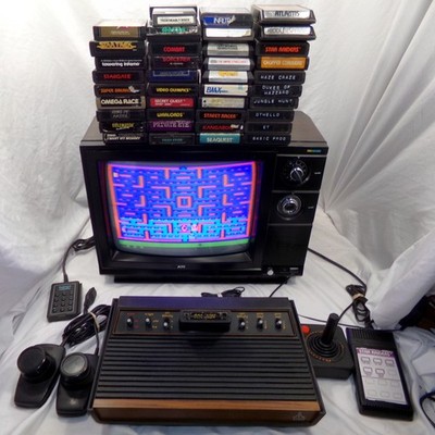 Atari 2600 Video Game System w/ Vtg 14'' Woodgrain TV 40 Games & Controllers