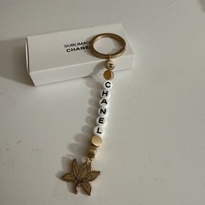Nuovo con scatola CHANEL BEAUTY SUBLIMAGE VIP REGALO portachiavi anello ciondolo borsa