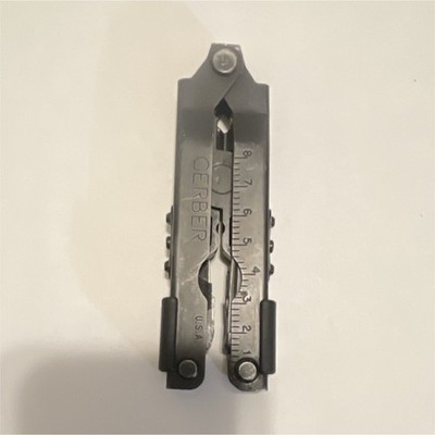 Gerber Black Multi-Tool, Plier, Knife, Bottle Opener, File, Ruler, Part Serrated