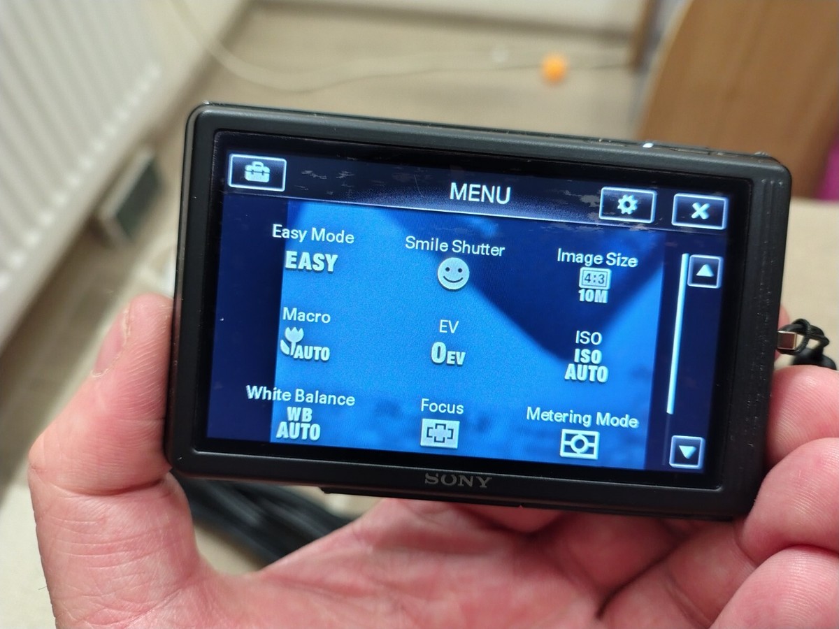 Sony Cyber-shot DSC-TX7 10.2MP Digital Camera - Black Fully