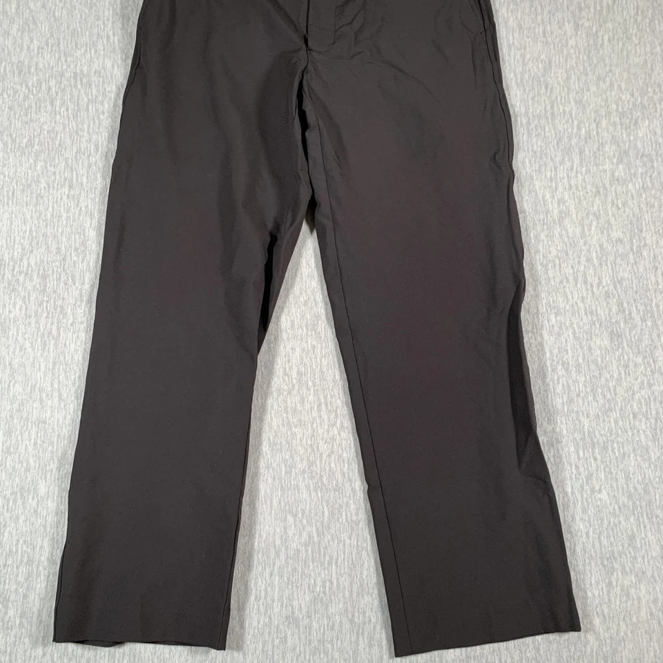 Pantalones de golf FootJoy para hombre 34x30 negros rendimiento elásticos frente plano tecnología chinos Foto 3 de 4