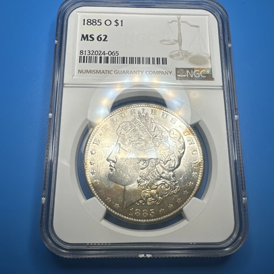 1885-O MORGAN DOLLAR NGC MS62 BEAUTIFUL IRIDESCENT CRESCENT YELLOW/GOLDEN TONING - Image 2 of 3