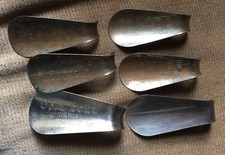 Six metal shoe horns, vintage, Schiff  Gold Bond