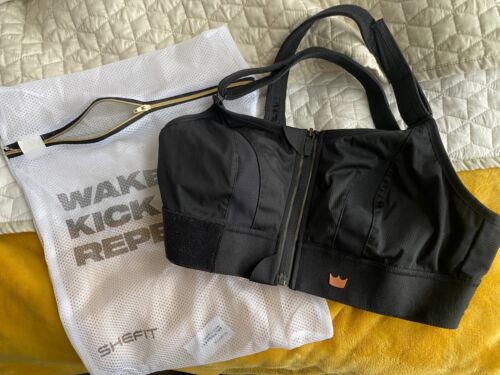 NEW SheFit ultimate sports bra size medium, black, with bag - high support